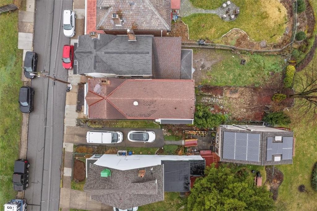 2811 Cobden Street Pittsburgh, PA 15203 - Photo 2 of 32 an aerial view of a house with a yard and a large tree