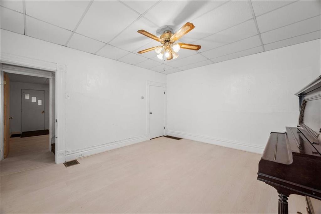 2811 Cobden Street Pittsburgh, PA 15203 - Photo 9 of 32 a view of an empty room with a window