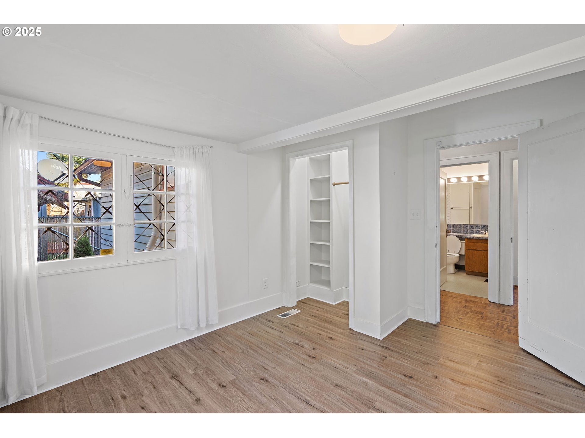 7139 Southeast 78th Avenue Portland, OR 97206 - Photo 23 of 41 wooden floor in an empty room