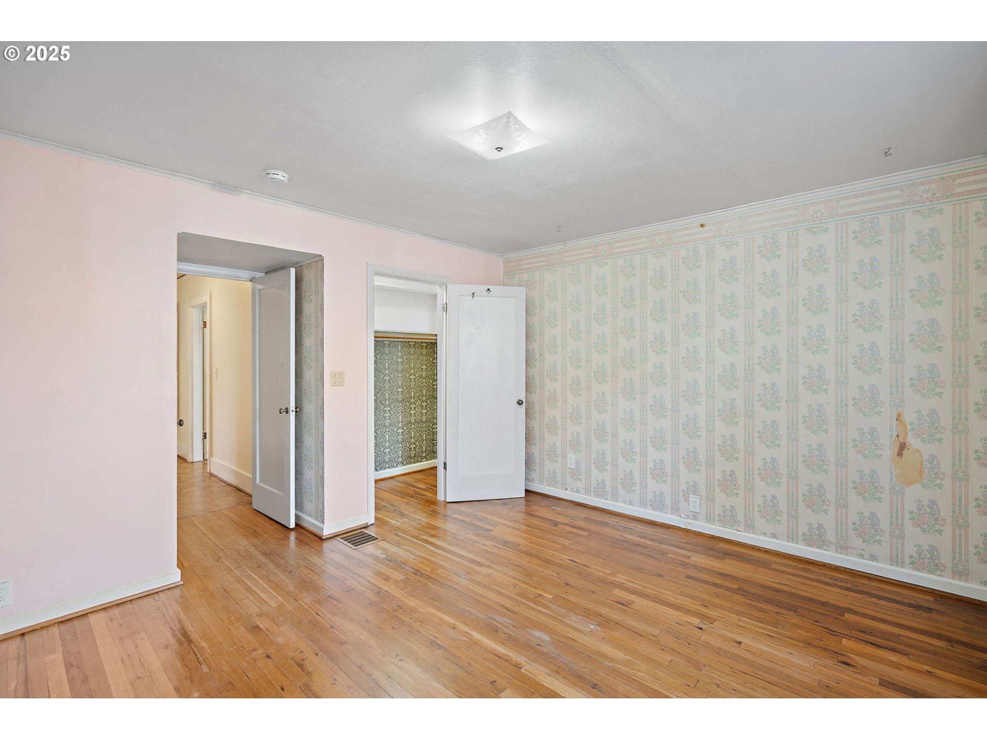 7139 Southeast 78th Avenue Portland, OR 97206 - Photo 24 of 41 a view of an empty room with wooden floor