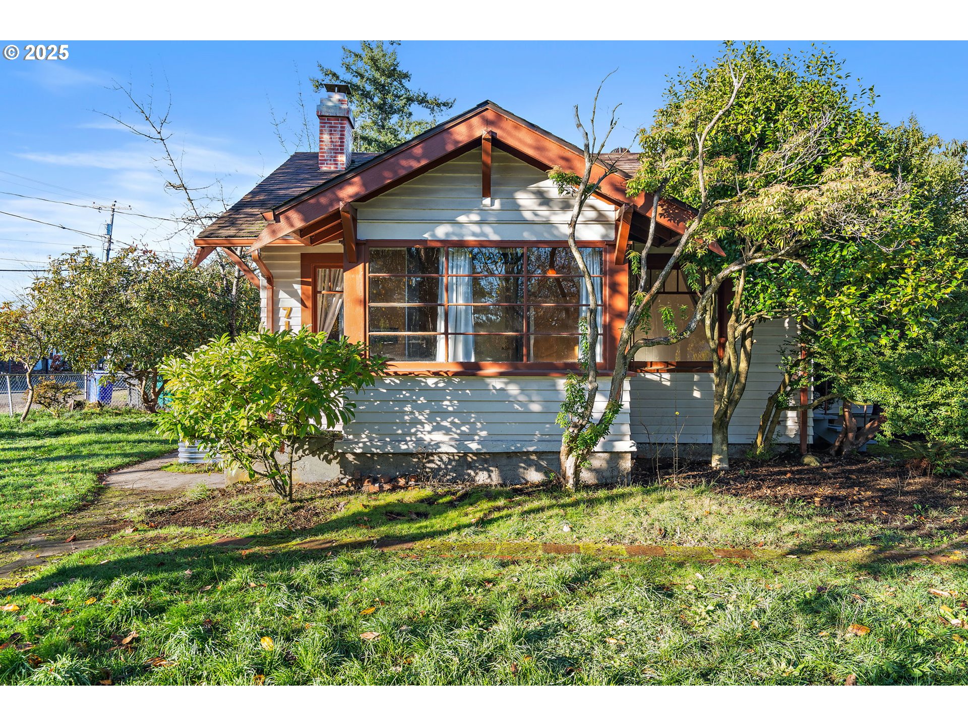 7139 Southeast 78th Avenue Portland, OR 97206 - Photo 37 of 41 a view of a house with a yard