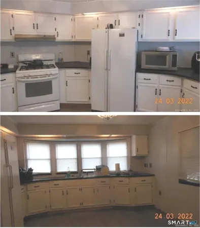a kitchen with stainless steel appliances a refrigerator and a stove