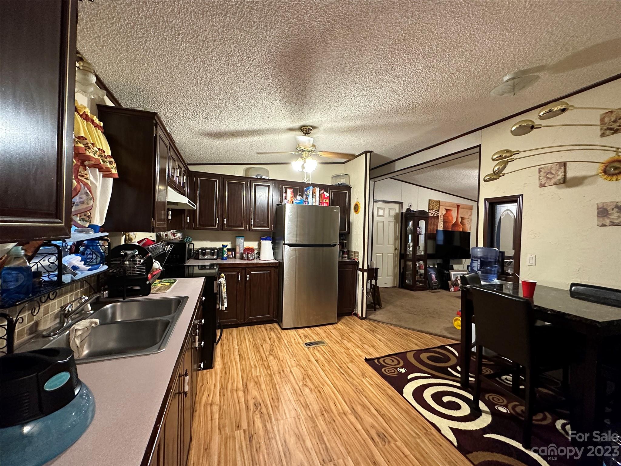 7289 Pyramid Road Hickory, NC 28602 - Photo 13 of 17 a kitchen with a sink appliances and cabinets