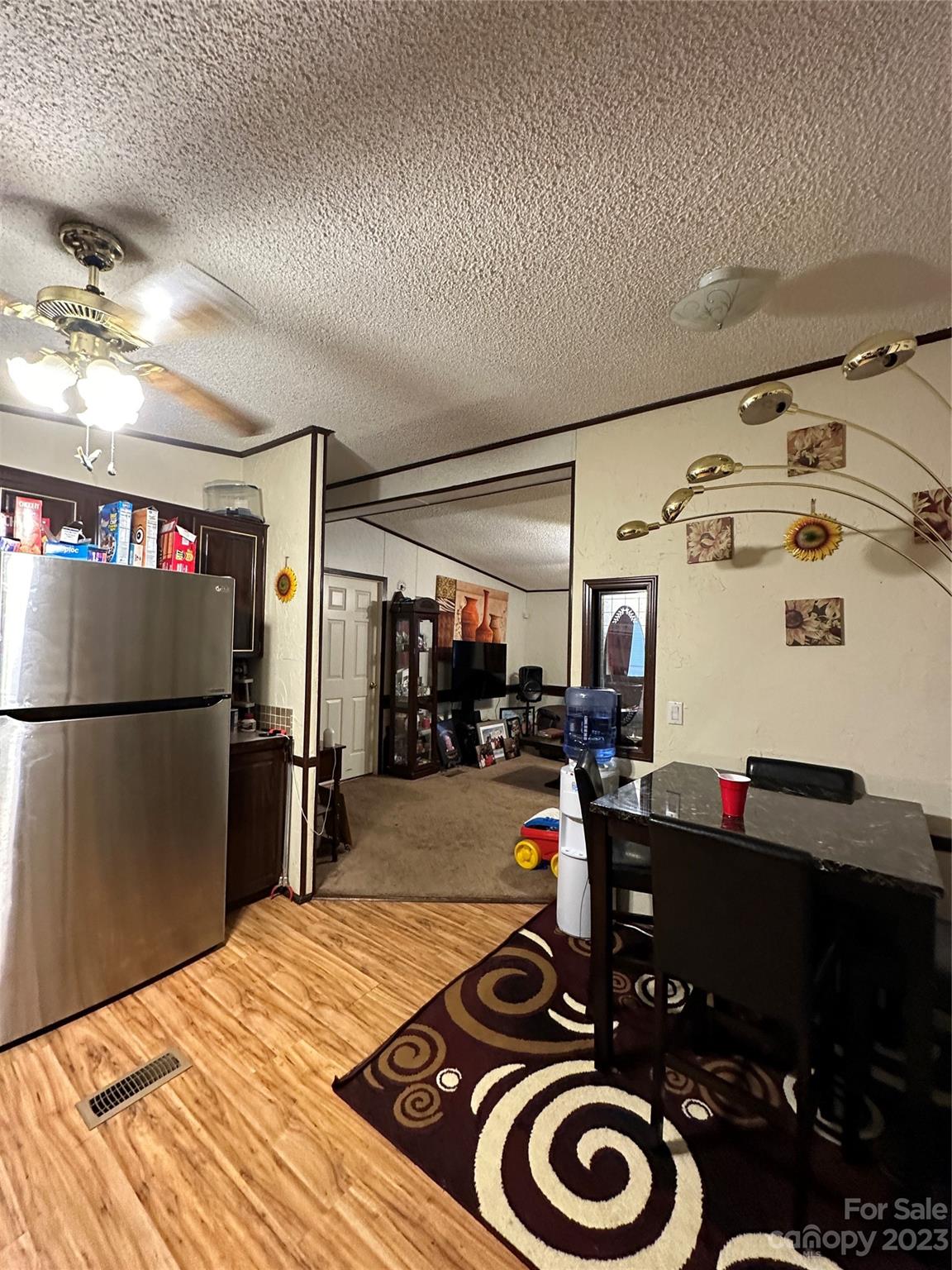 7289 Pyramid Road Hickory, NC 28602 - Photo 14 of 17 a kitchen with a refrigerator and a stove top oven