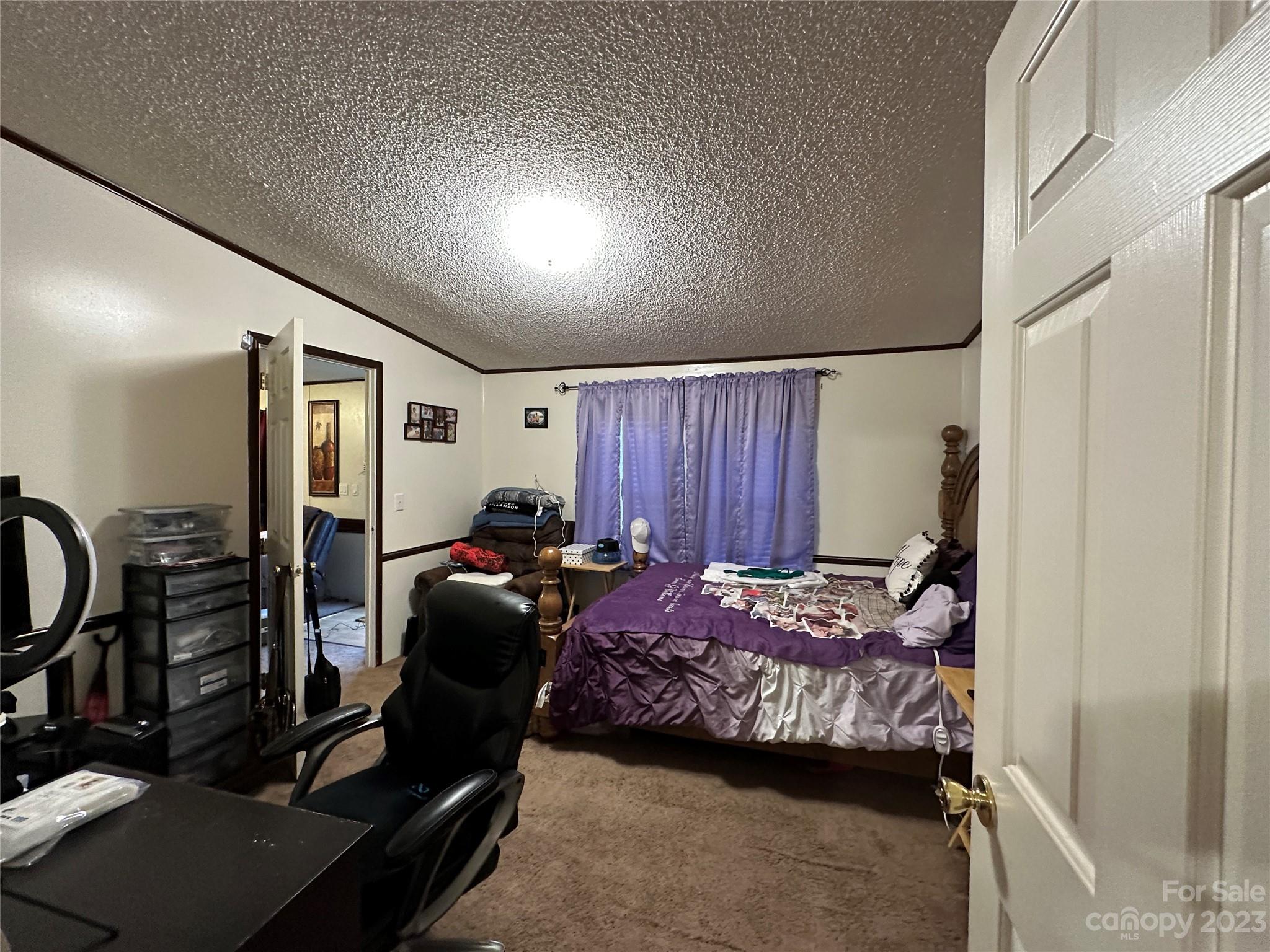 7289 Pyramid Road Hickory, NC 28602 - Photo 4 of 17 a bedroom with furniture and a window