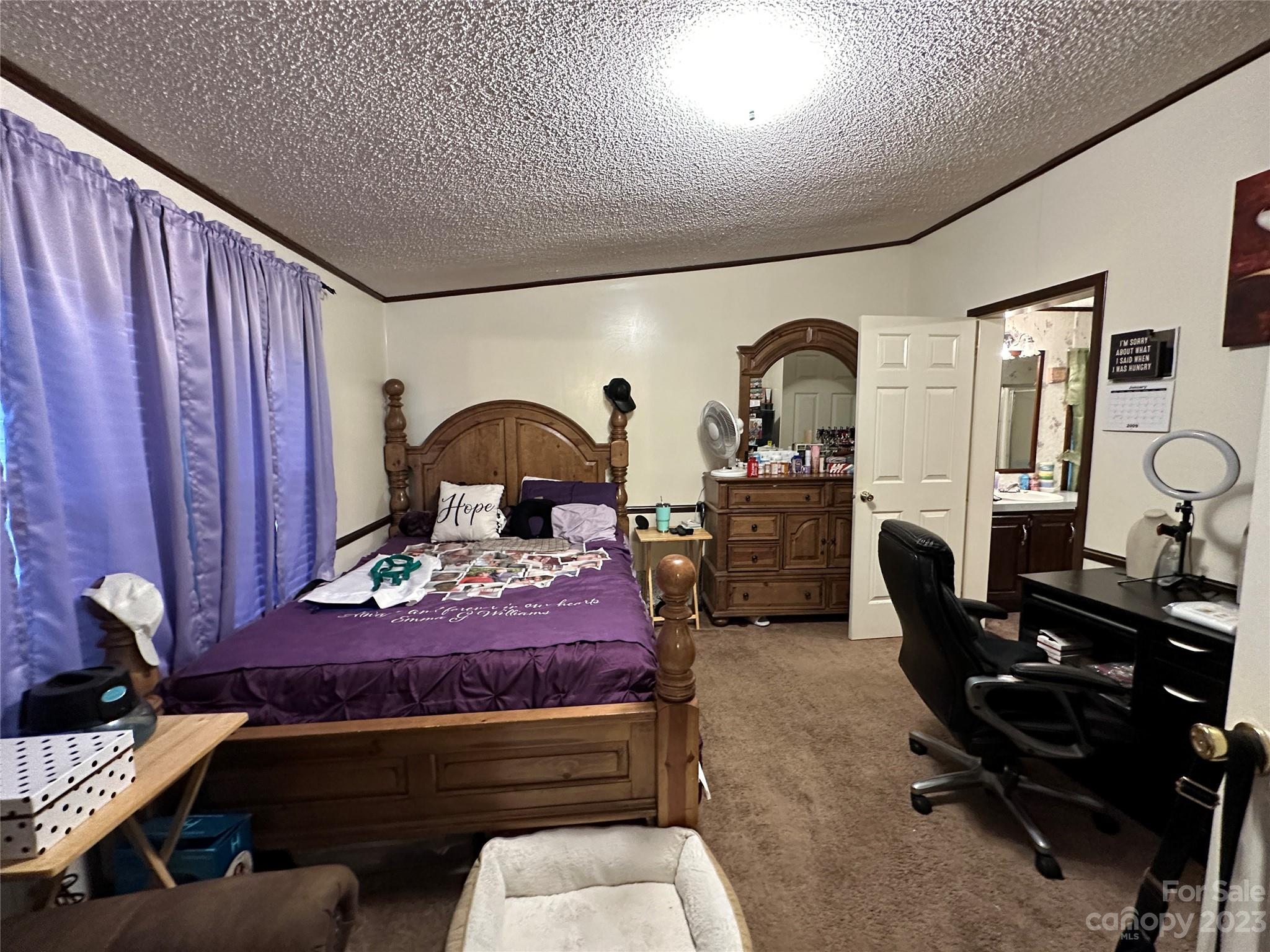 7289 Pyramid Road Hickory, NC 28602 - Photo 5 of 17 a living room with furniture gym equipment and a rug