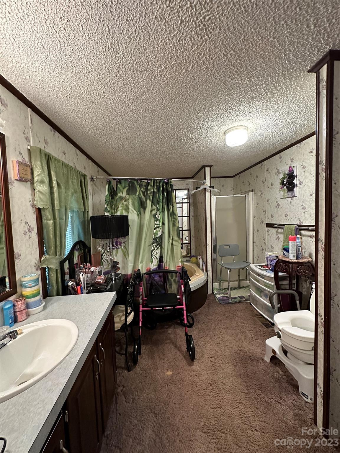 7289 Pyramid Road Hickory, NC 28602 - Photo 7 of 17 a living room with furniture and a flat screen tv