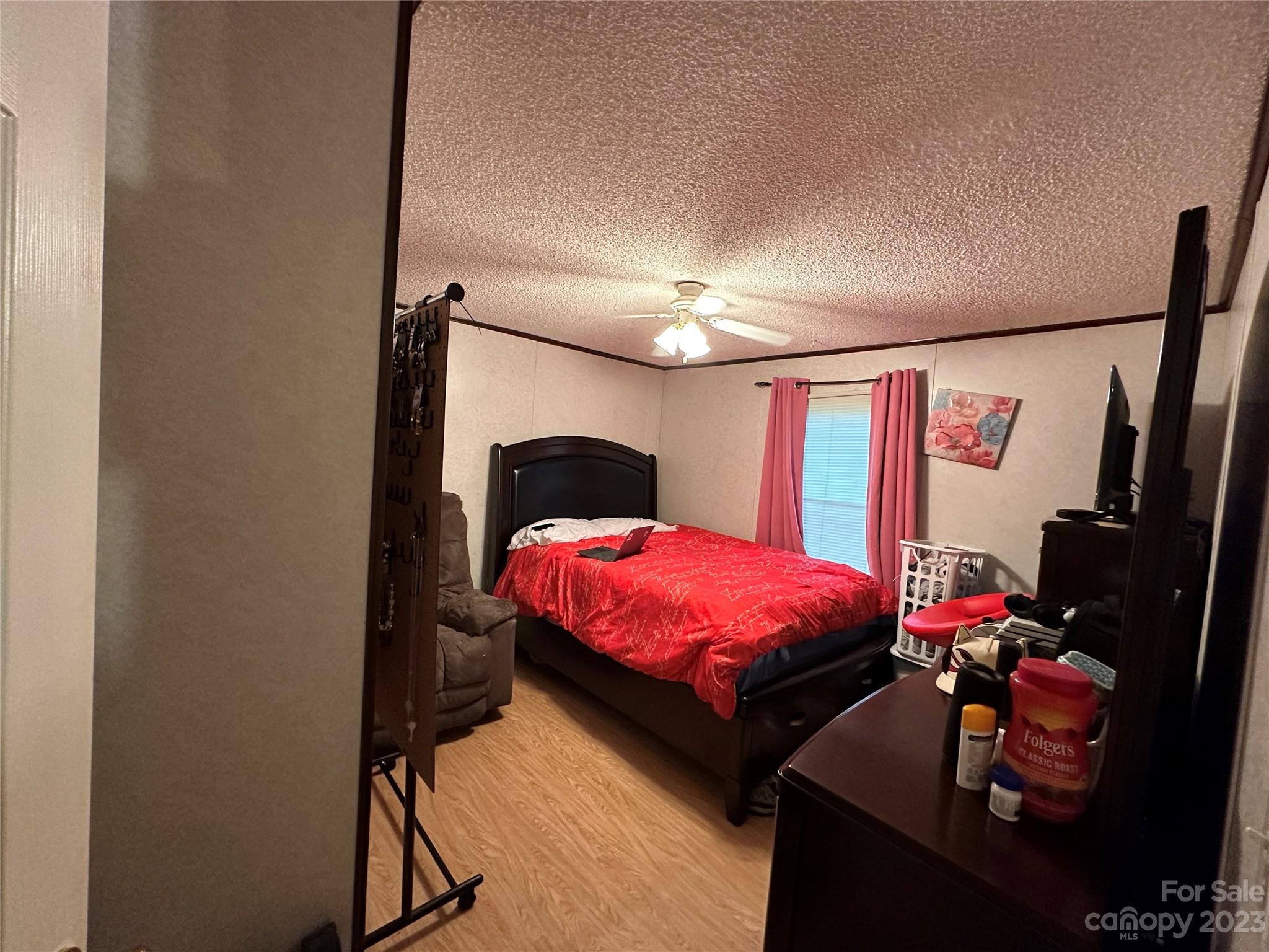 7289 Pyramid Road Hickory, NC 28602 - Photo 8 of 17 a bedroom with a bed and a mirror