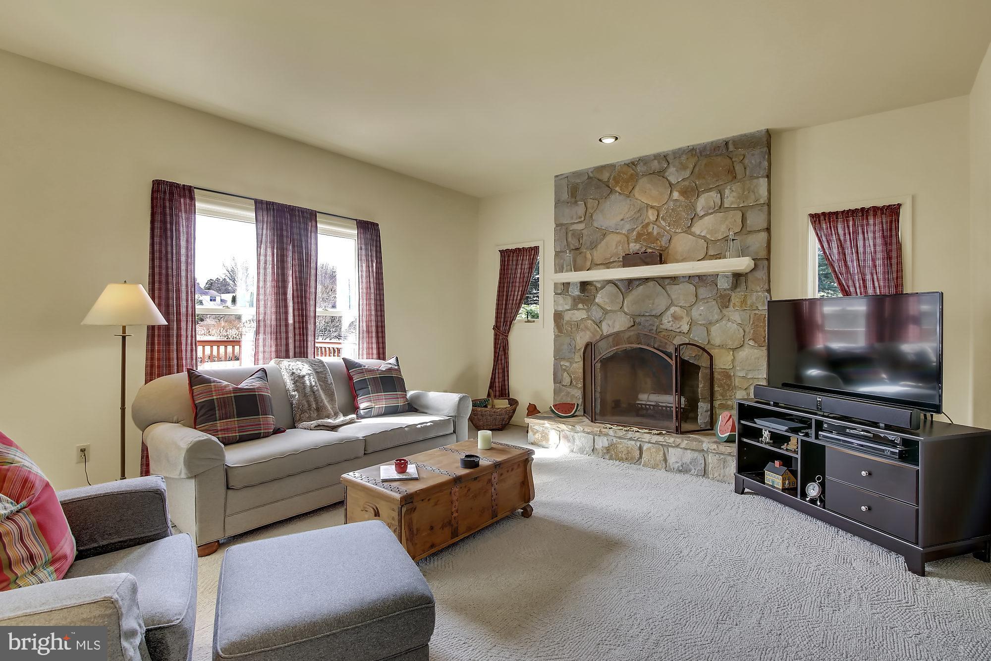 603 Aberdeen Road Kennett Square, PA 19348 - Photo 8 of 32 Family Room with Cozy Wood Fireplace