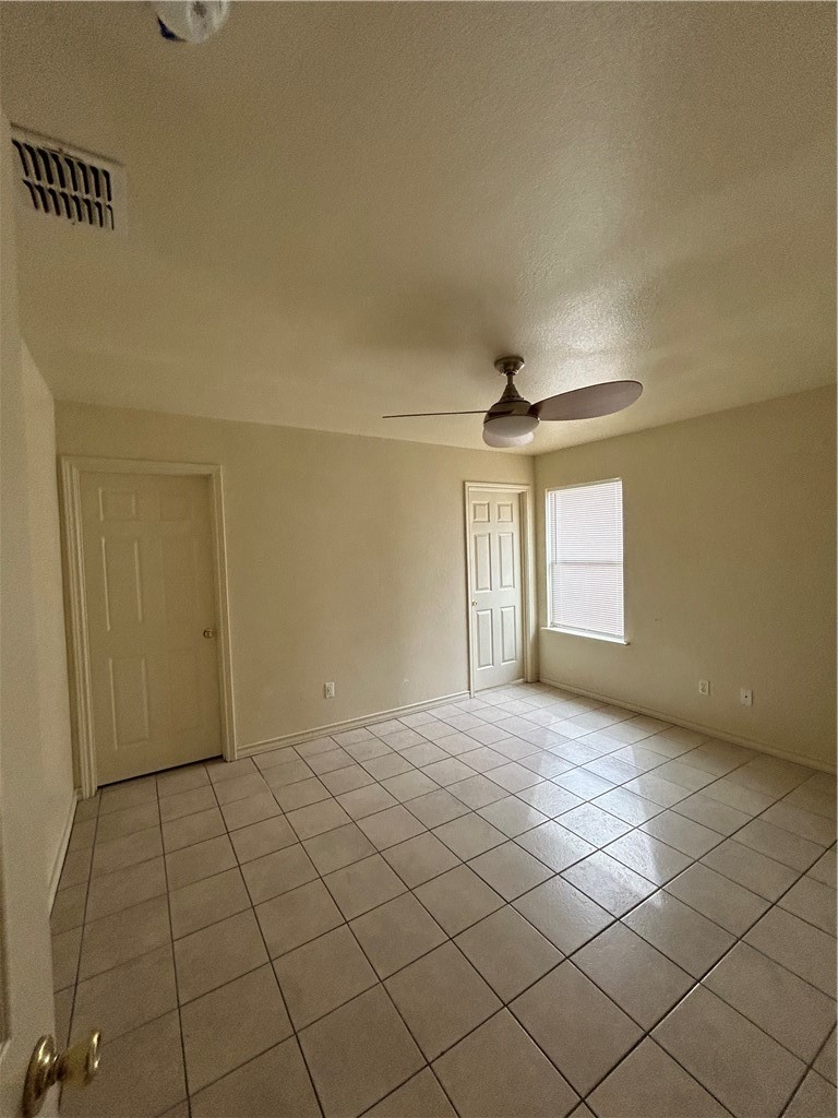 1401 Dewitt Street Corpus Christi, TX 78418 - Photo 7 of 11 a view of an empty room and window