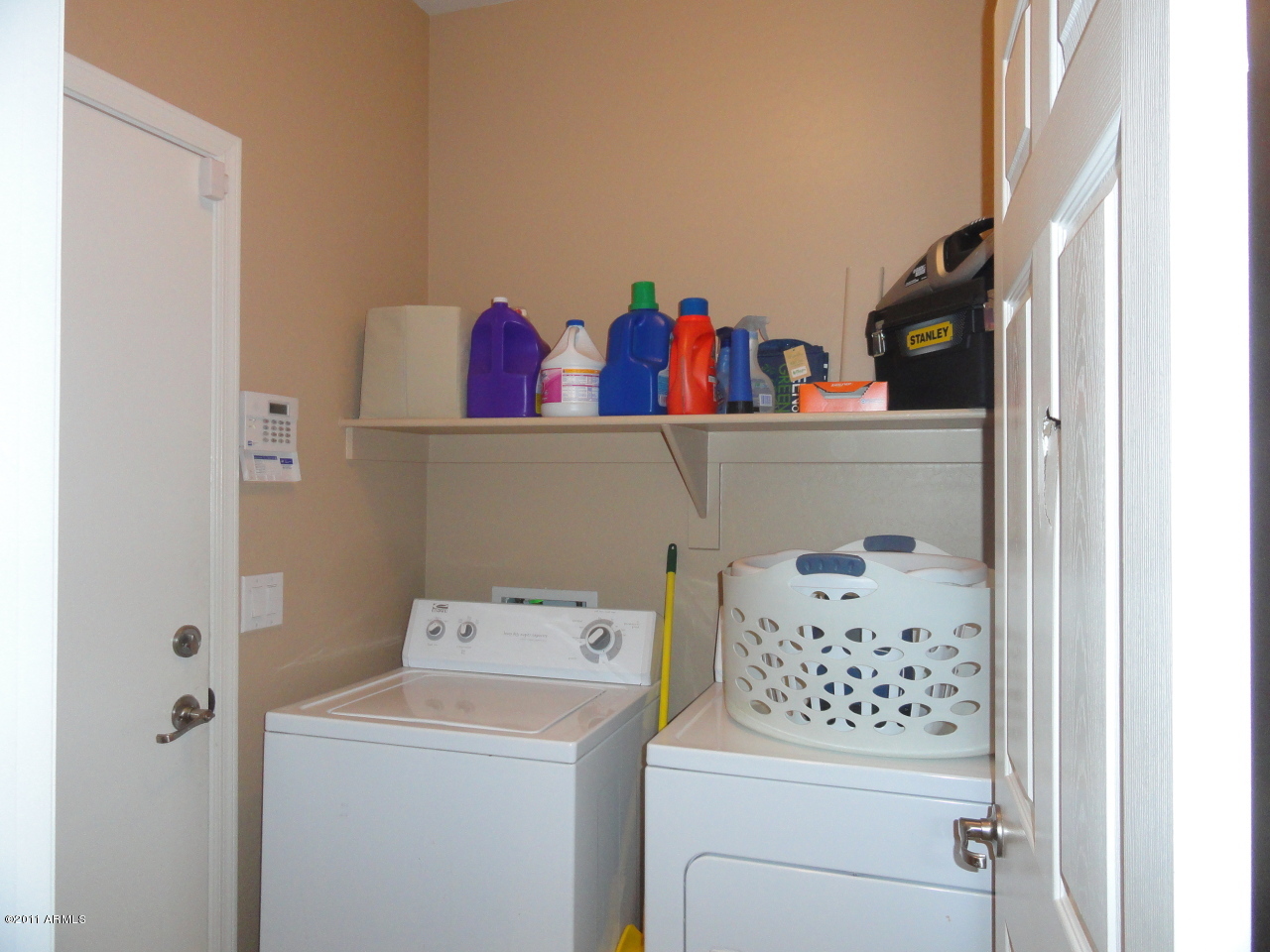 10213 West Chipman Road Tolleson, AZ 85353 - Photo 4 of 10 Convenient Inside Utility Room