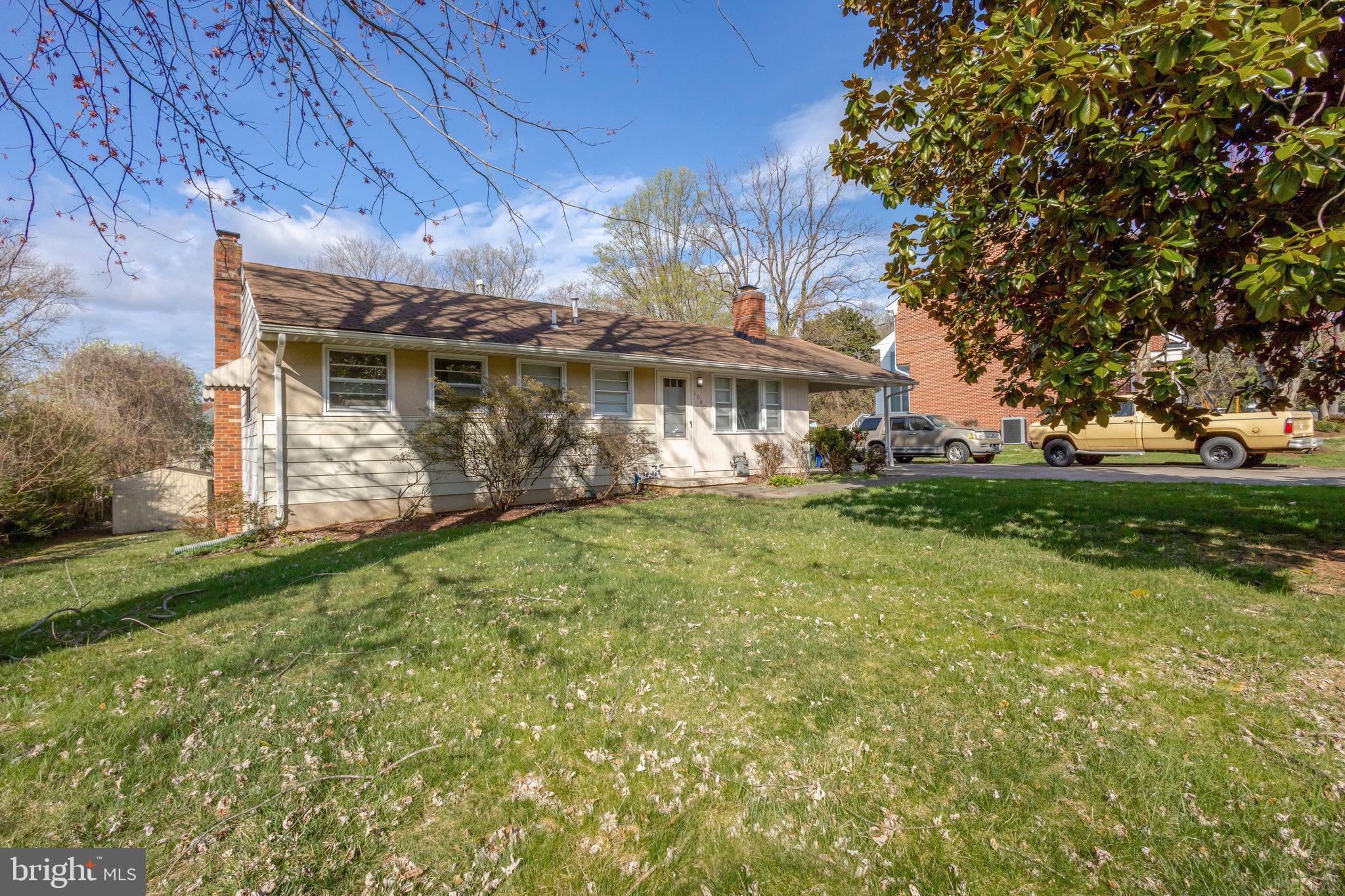 5008 Backlick Road Annandale, VA 22003 - Photo 14 of 14 a front view of a house with garden