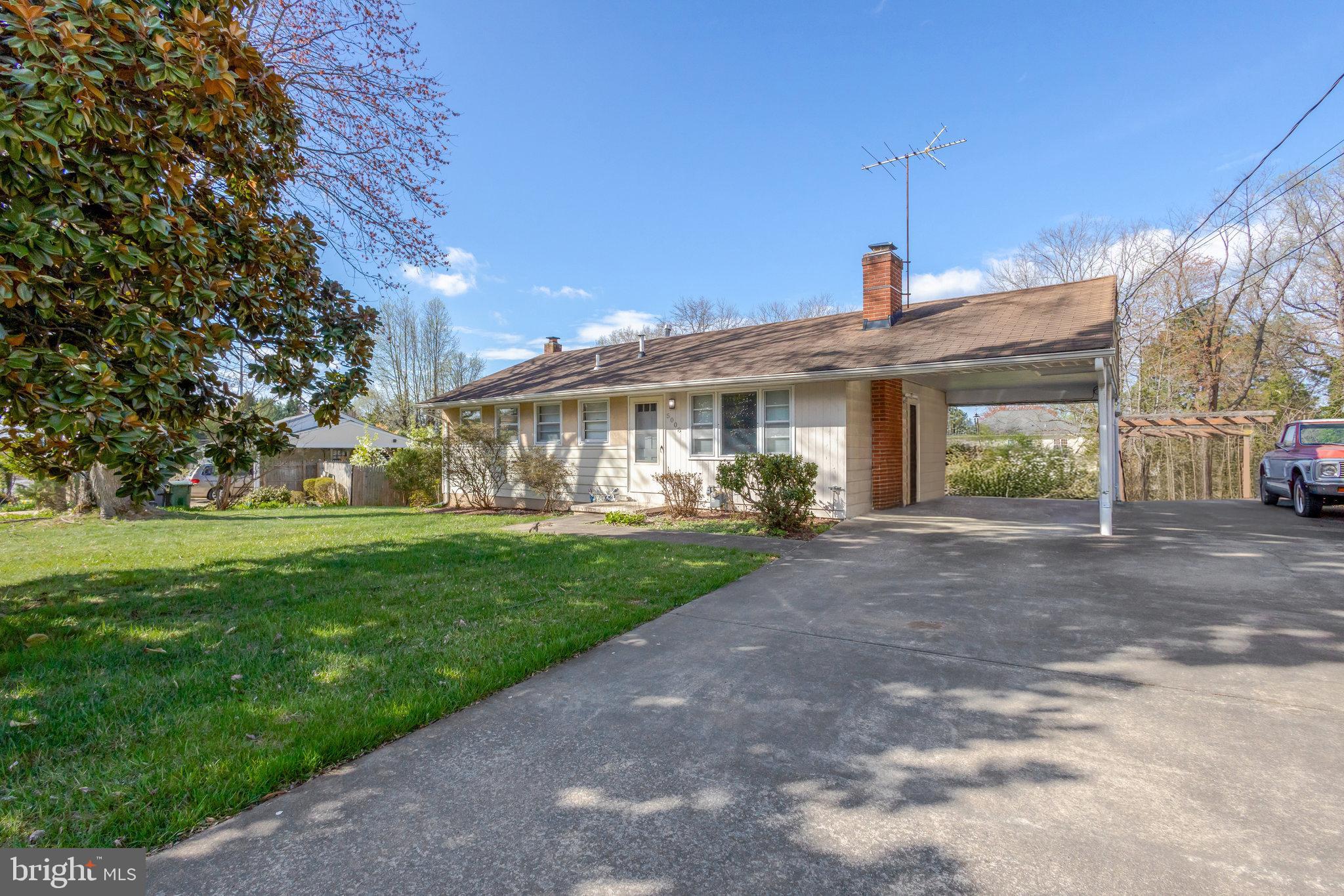 5008 Backlick Road Annandale, VA 22003 - Photo 2 of 14 a view of a house with a yard