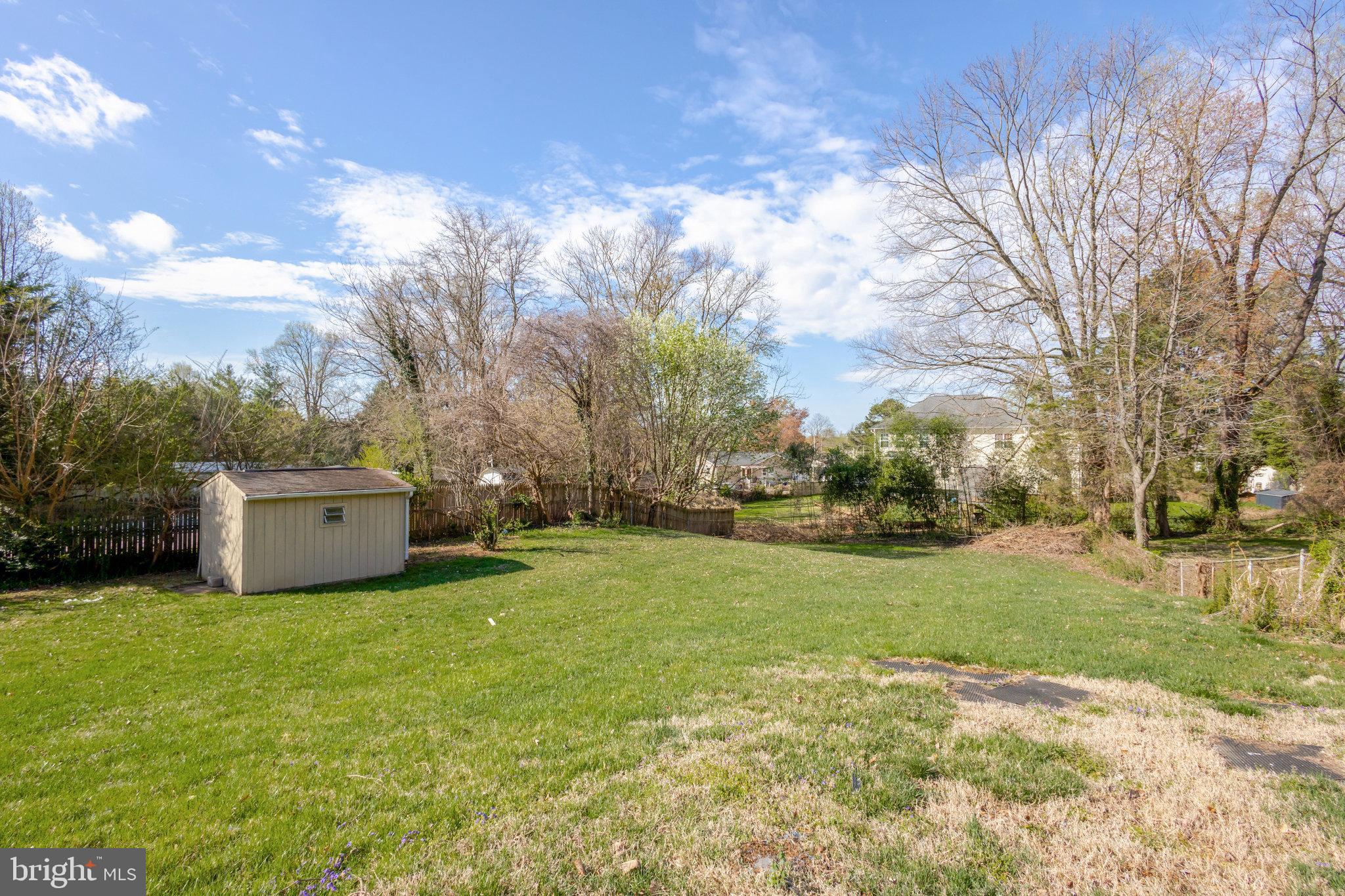 5008 Backlick Road Annandale, VA 22003 - Photo 6 of 14 a view of a big yard with palm trees