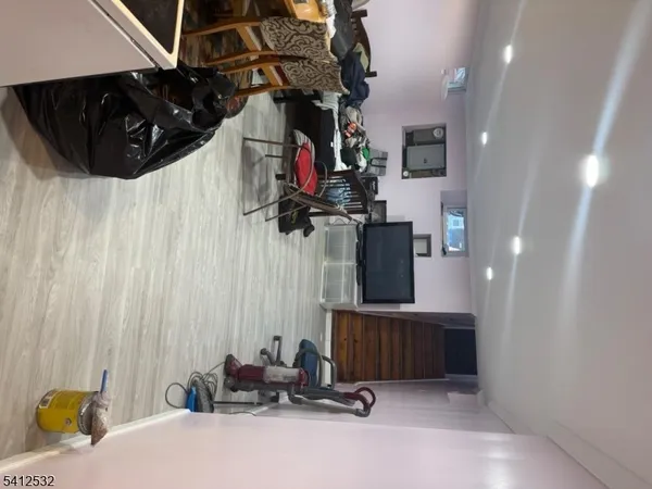 a room with gym equipment and a mirror