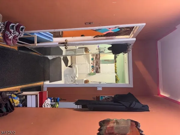 a room with furniture and a window