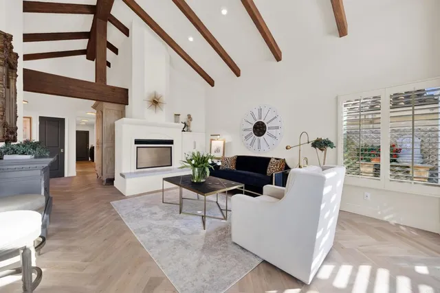 a large kitchen with stainless steel appliances granite countertop a sink and dishwasher with wooden floor