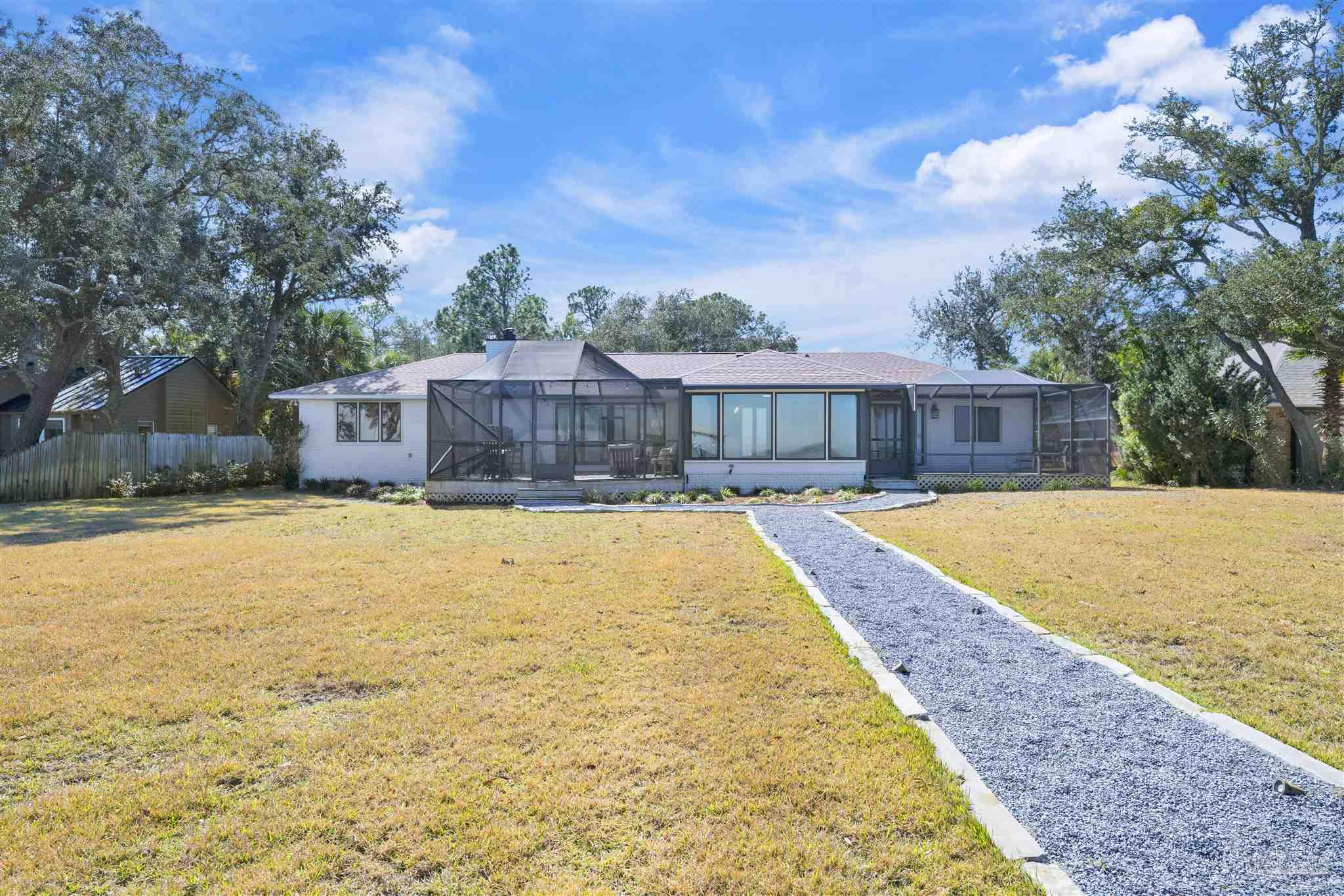 5470 North Shore Road Pensacola, FL 32507 - Photo 49 of 63 a view of swimming pool with a patio