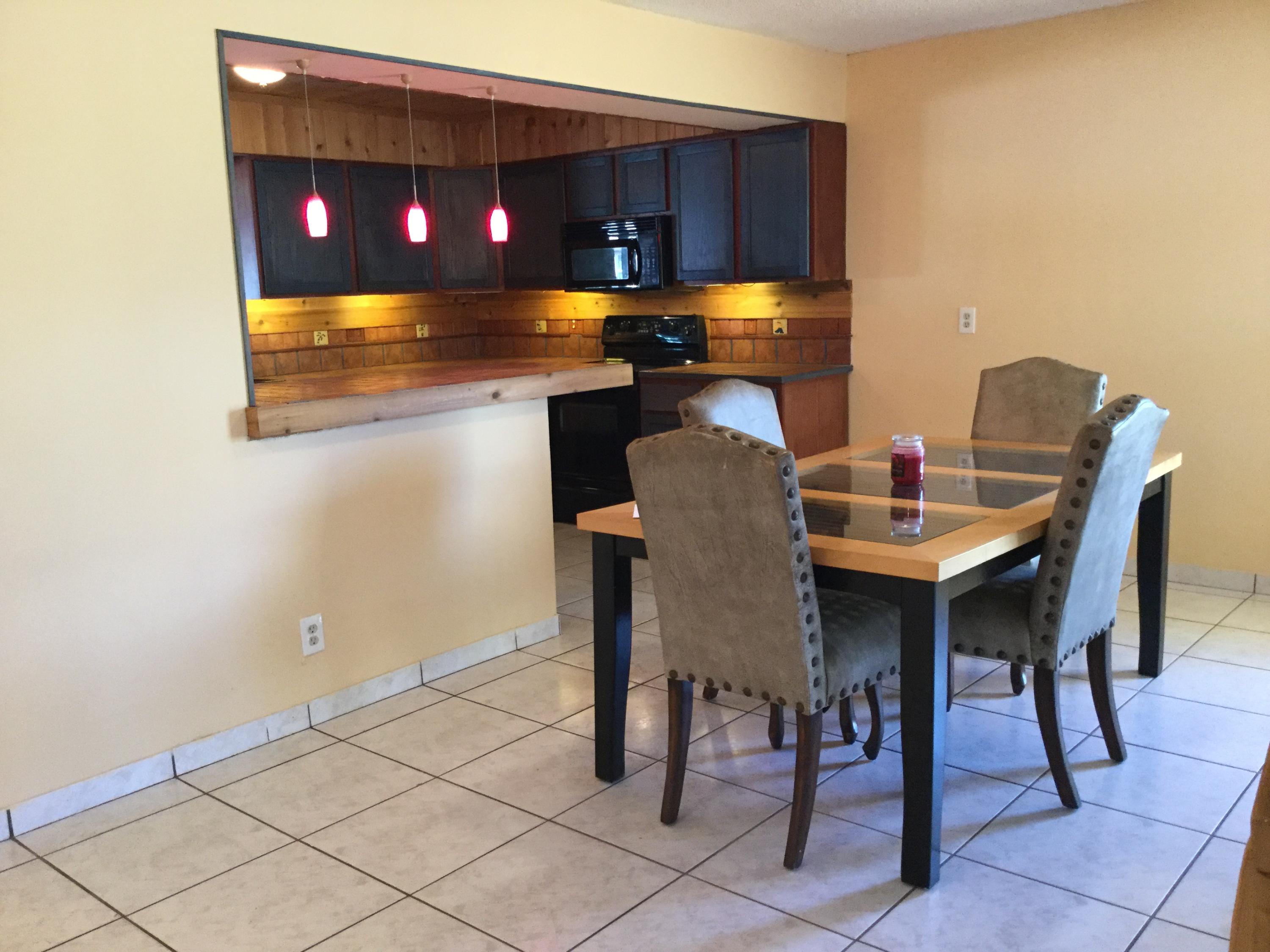 2465 Southridge Road Delray Beach, FL 33444 - Photo 8 of 30 Dining area into kitchen