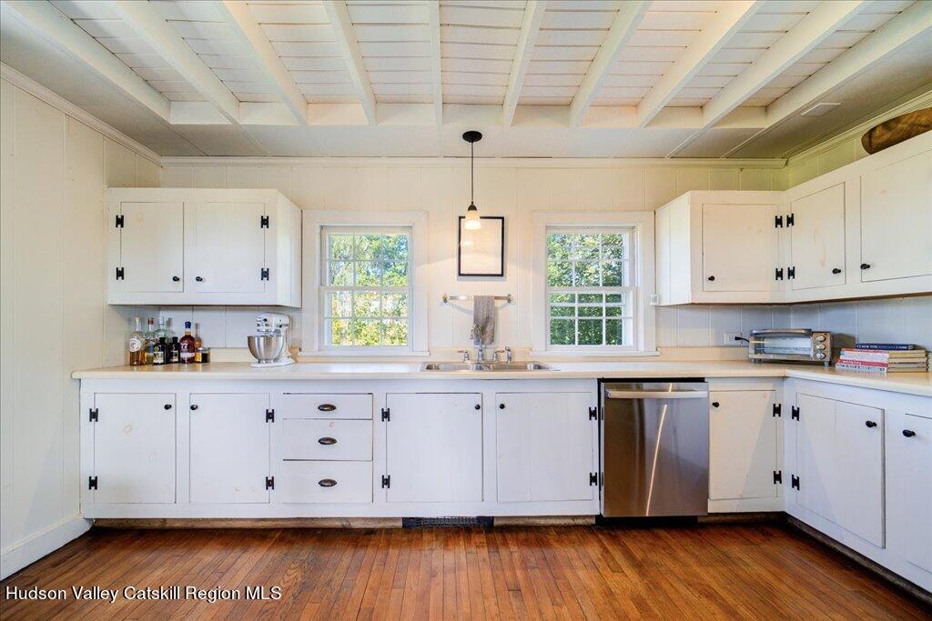 2184 Bruynswick Road Wallkill, NY 12589 - Photo 3 of 34 a kitchen with cabinets wooden floor and a window