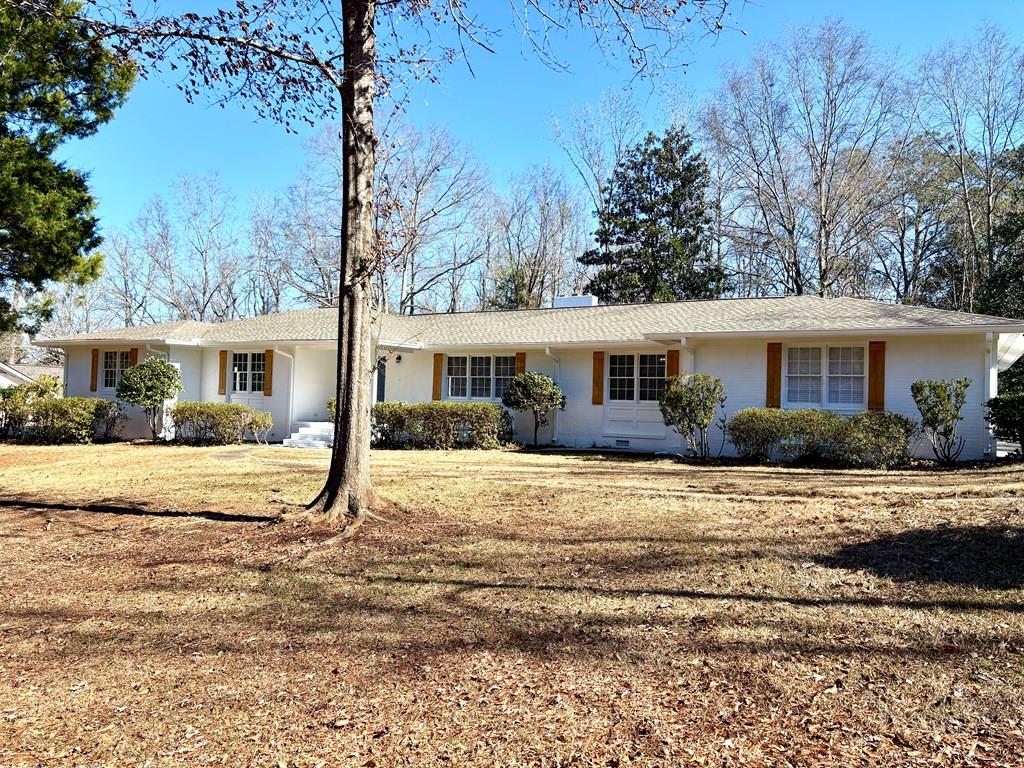 2502 13th Avenue Valley, AL 36854 - Photo 1 of 56 a front view of a house with a patio