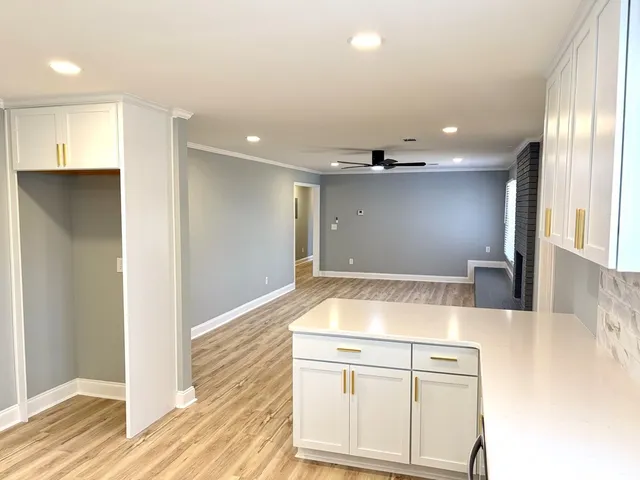 a view of a kitchen with a sink