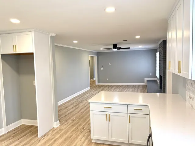 a view of a kitchen with a sink