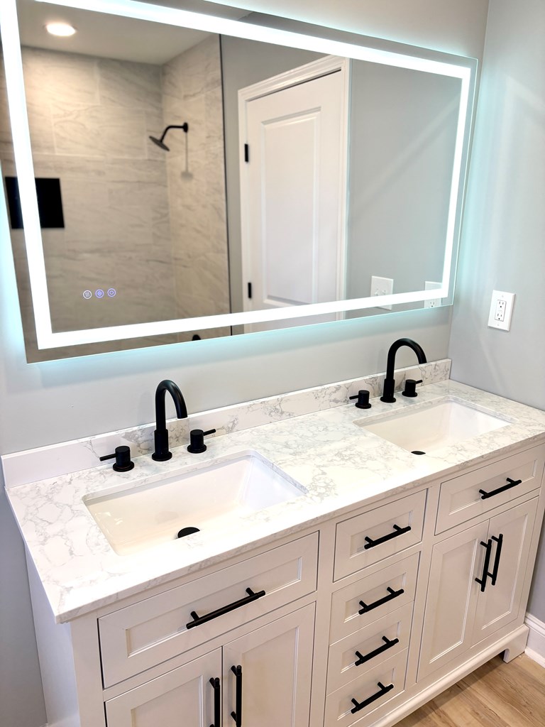 2502 13th Avenue Valley, AL 36854 - Photo 29 of 56 a bathroom with a sink and a mirror