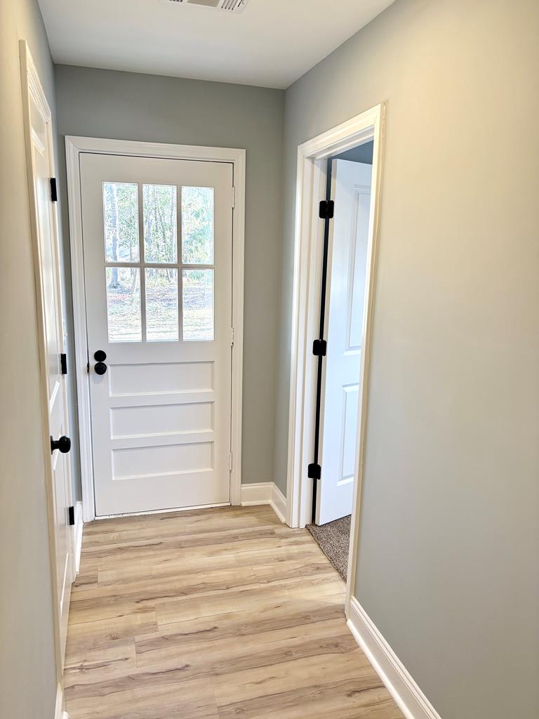 2502 13th Avenue Valley, AL 36854 - Photo 32 of 56 a view of a bathroom with wooden floor and a window