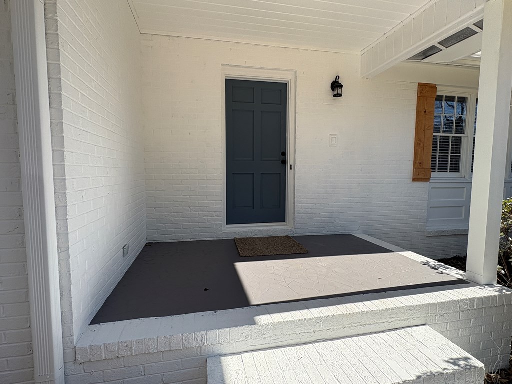 2502 13th Avenue Valley, AL 36854 - Photo 38 of 56 a bedroom with a bed and a window