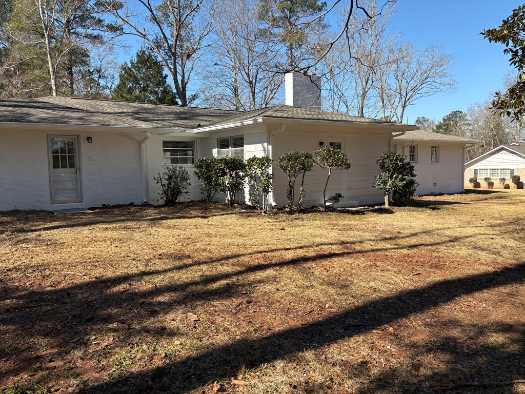2502 13th Avenue Valley, AL 36854 - Photo 45 of 56 a view of a house with snow on the side of the road