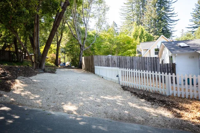 a view of backyard with green space