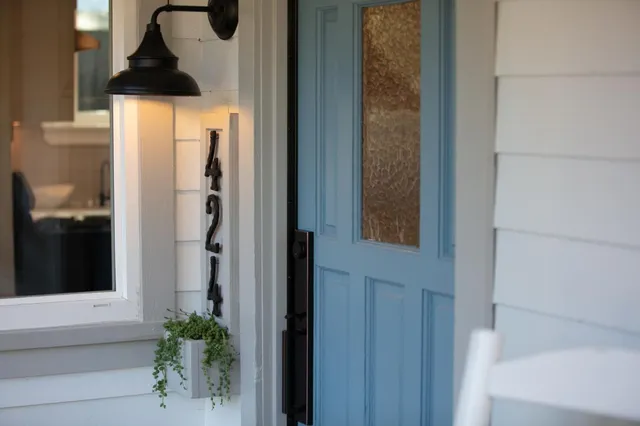 a view of balcony with wooden floor and fence