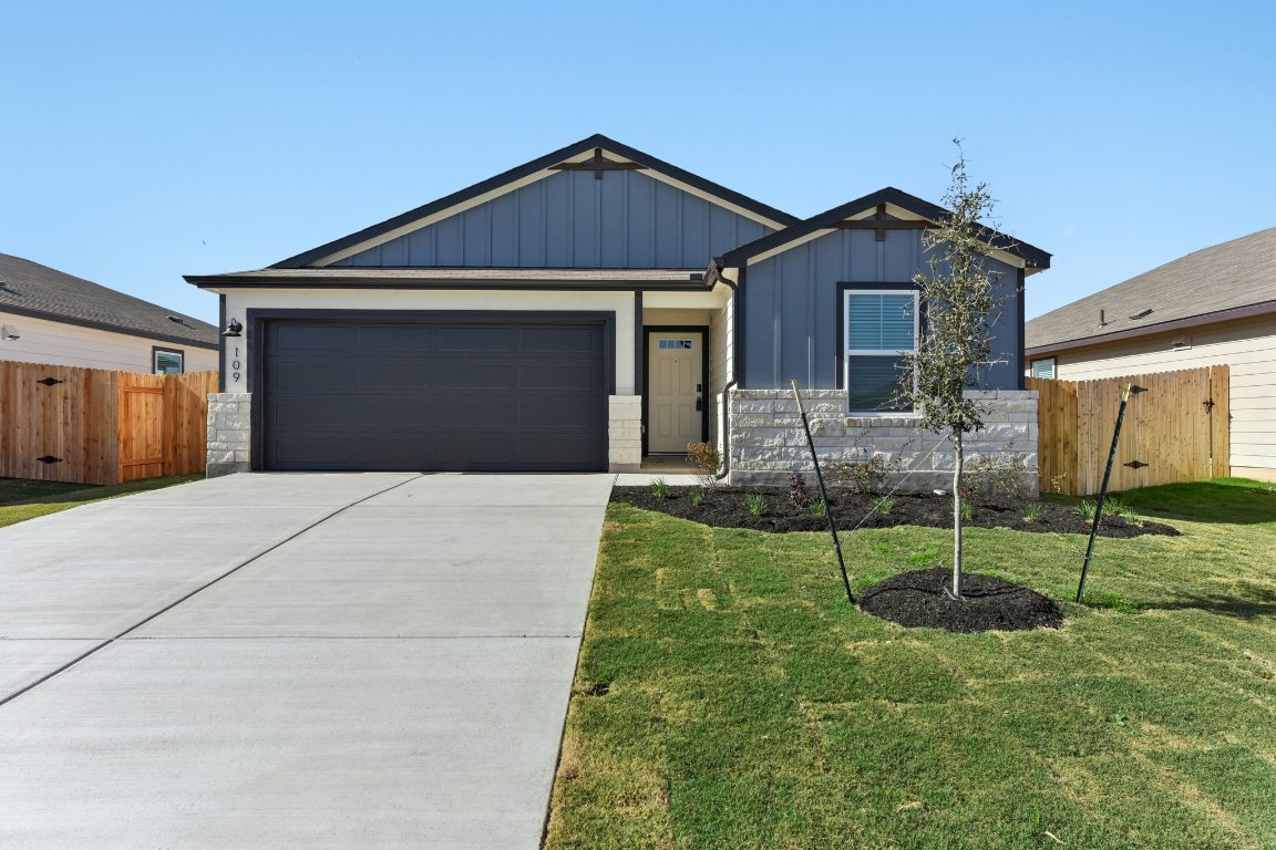 a house view with a garden space