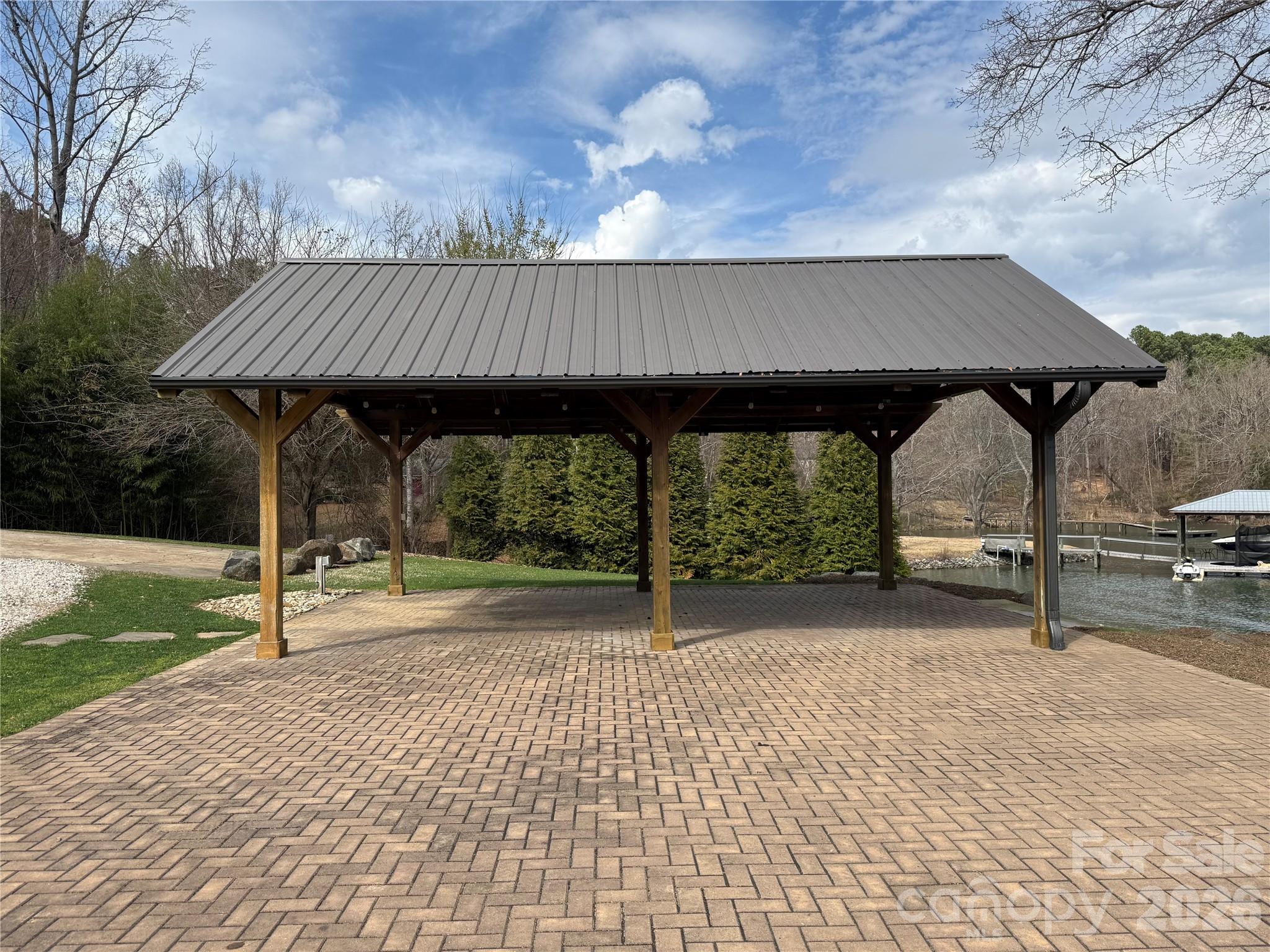 0 Sussex Road York, SC 29745 - Photo 9 of 20 a backyard of a house with table and chairs