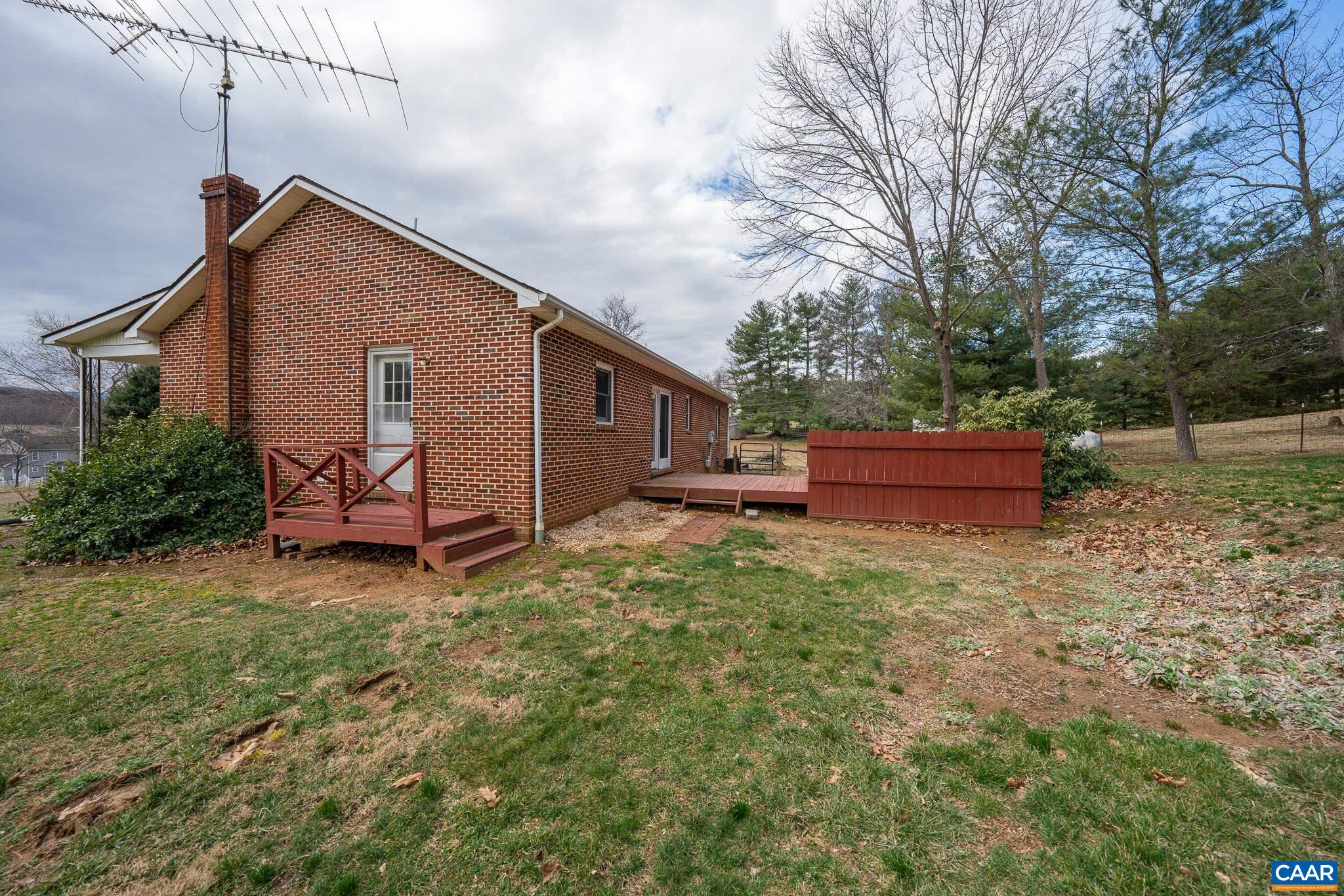 49 Chestnut Ridge Road Staunton, VA 24401 - Photo 36 of 55 a backyard of a house with oven and yard