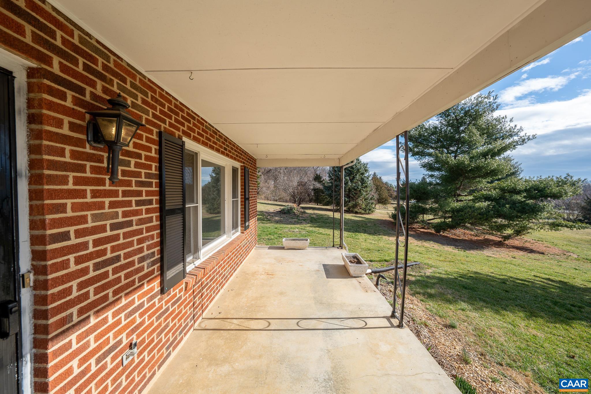49 Chestnut Ridge Road Staunton, VA 24401 - Photo 4 of 55 a view of backyard with tv