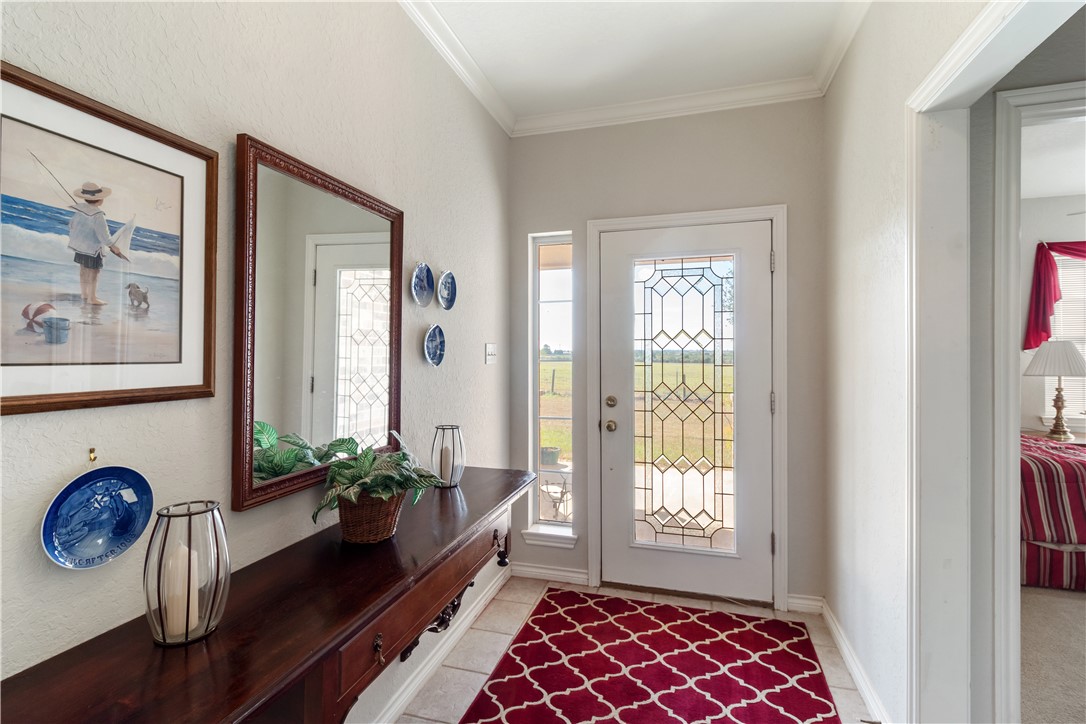 28109 Waller Gladish Road Waller, TX 77484 - Photo 17 of 28 a living room with furniture and a potted plant