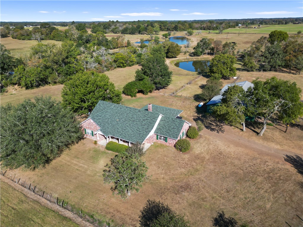 28109 Waller Gladish Road Waller, TX 77484 - Photo 2 of 28 an aerial view of a house with yard