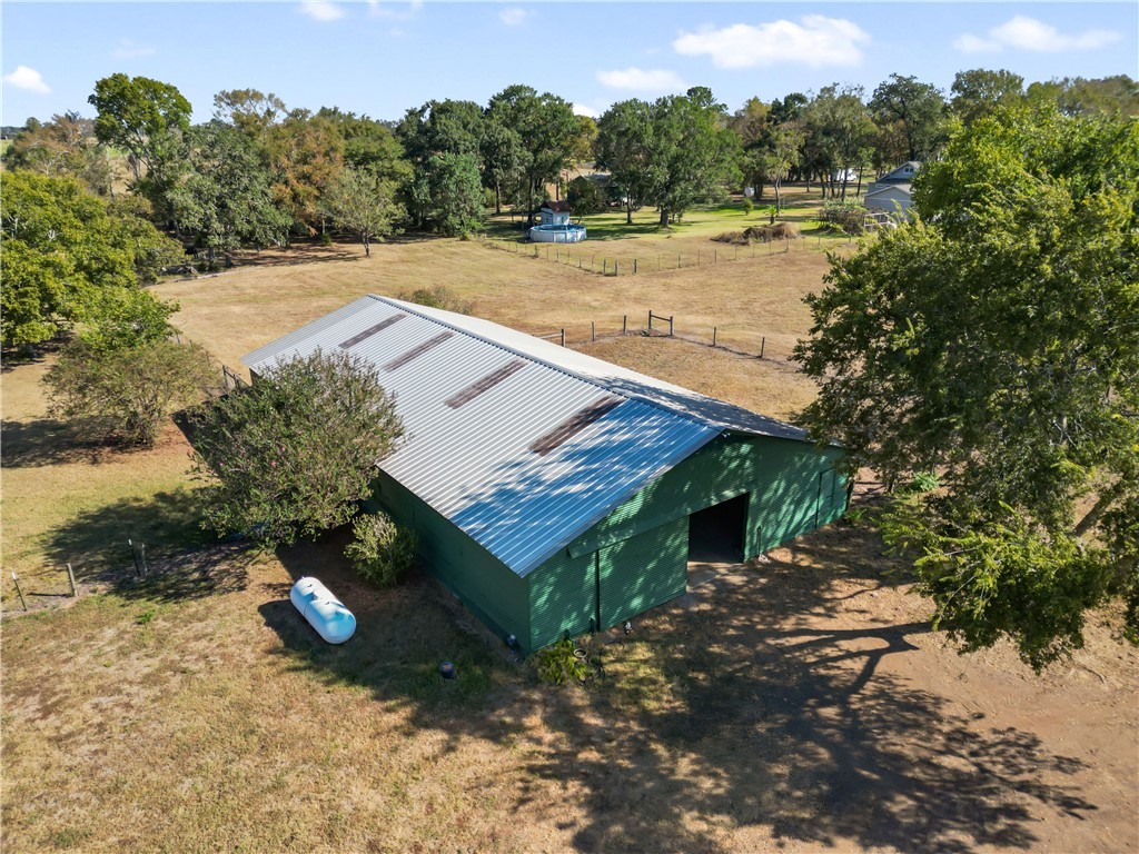 28109 Waller Gladish Road Waller, TX 77484 - Photo 3 of 28 a view of a yard with wooden fence