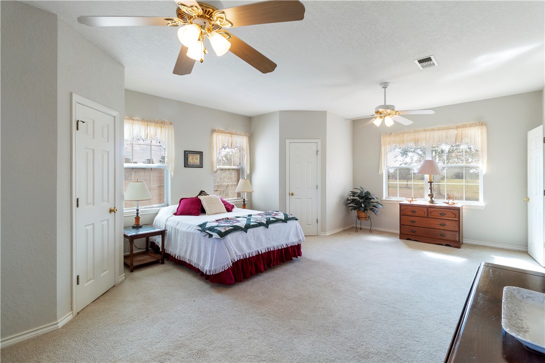 28109 Waller Gladish Road Waller, TX 77484 - Photo 6 of 28 a living room with furniture and large windows
