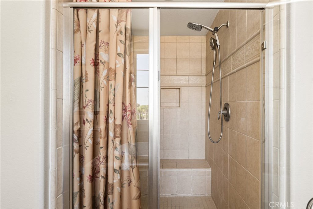 12652 Twin Peak Court Riverside, CA 92503 - Photo 27 of 55 a bathroom with a shower