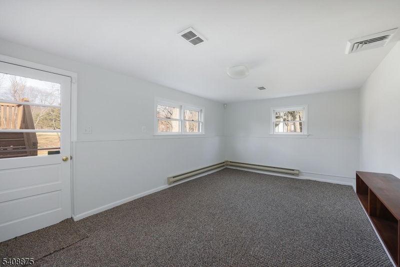 49 Overlook Road Morristown, NJ 07960 - Photo 20 of 28 a view of an empty room and a window