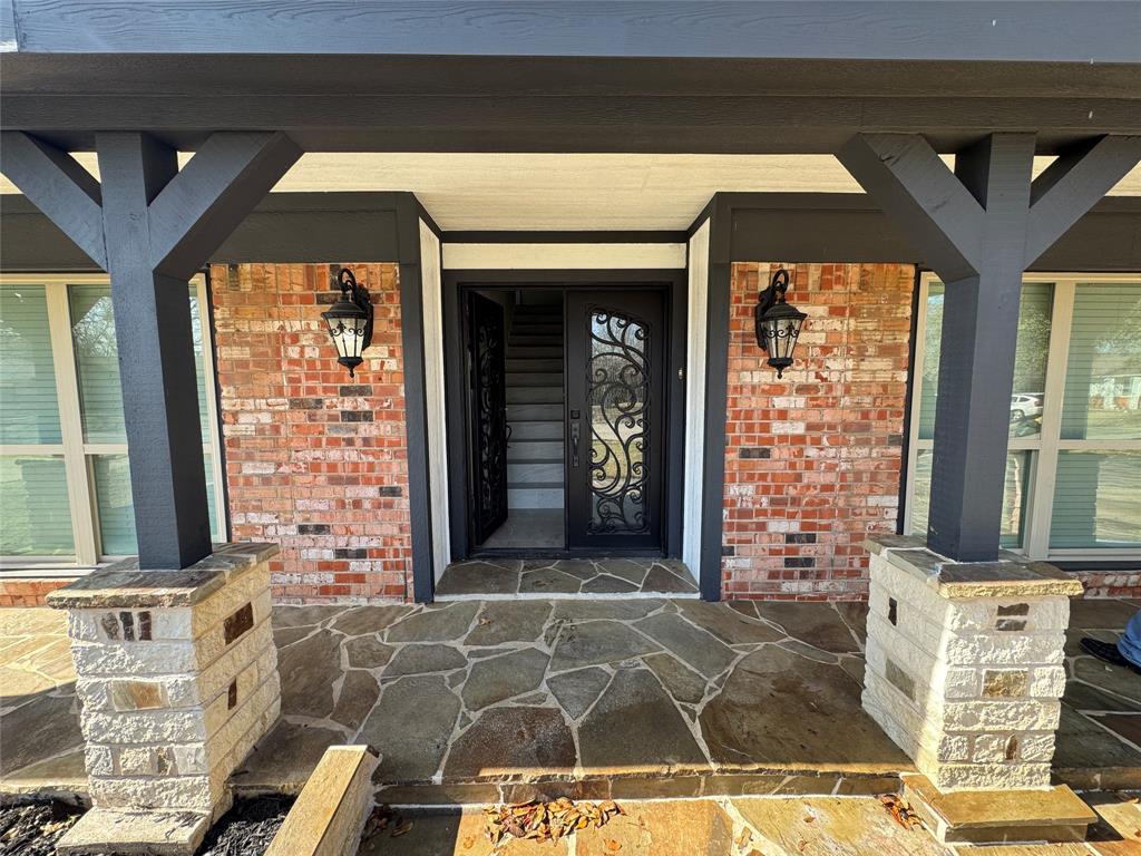 408 Steeple Ridge Road Everman, TX 76140 - Photo 2 of 14 a front view of a building