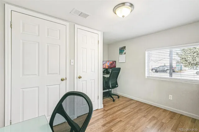 a view of a livingroom with furniture and window