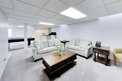 a living room with furniture and a couch