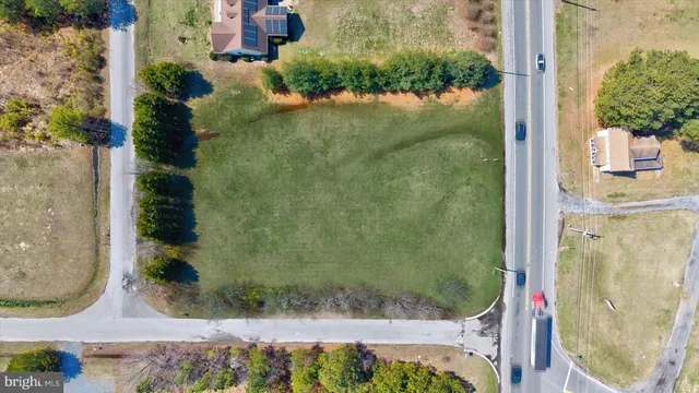 an aerial view of residential house with outdoor space