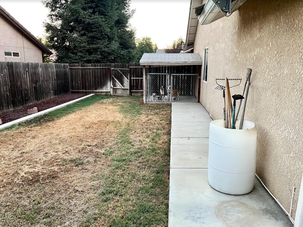922 Sequoia Street Parlier, CA 93648 - Photo 15 of 16 a view of house with backyard