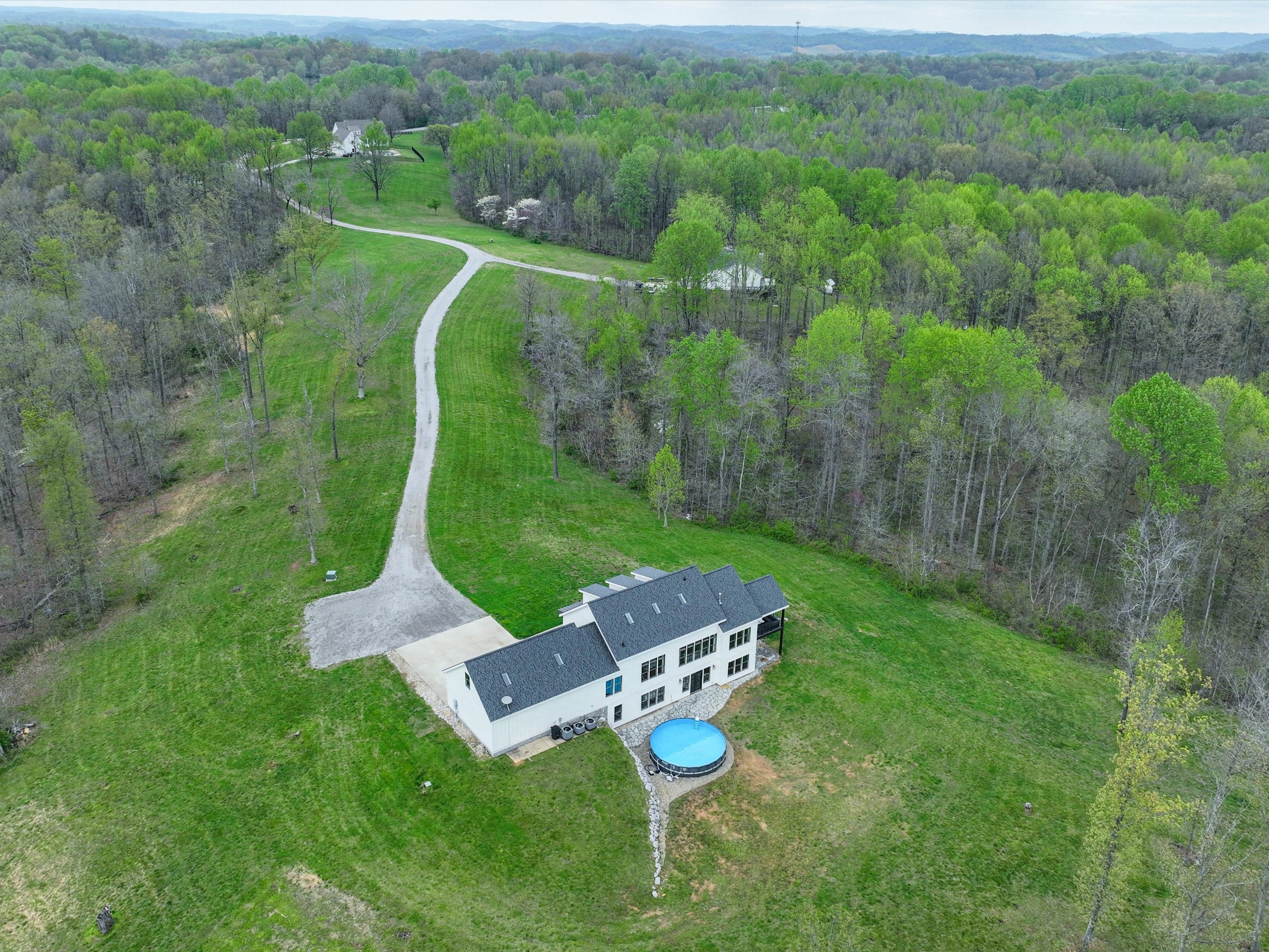 1831 Sugar Ridge Road Spring Hill, TN 37174 - Photo 44 of 48 a view of a table and chairs in the big yard
