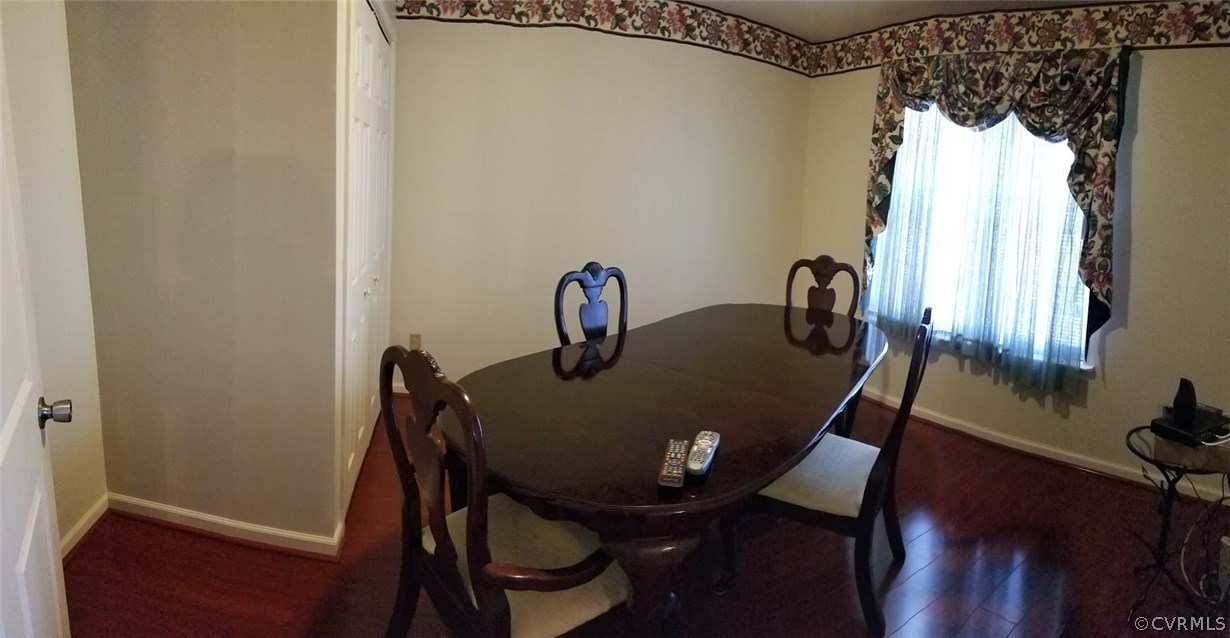 1224 Tree Ridge Road Henrico, VA 23231 - Photo 10 of 20 a view of a room with a table and chairs in it